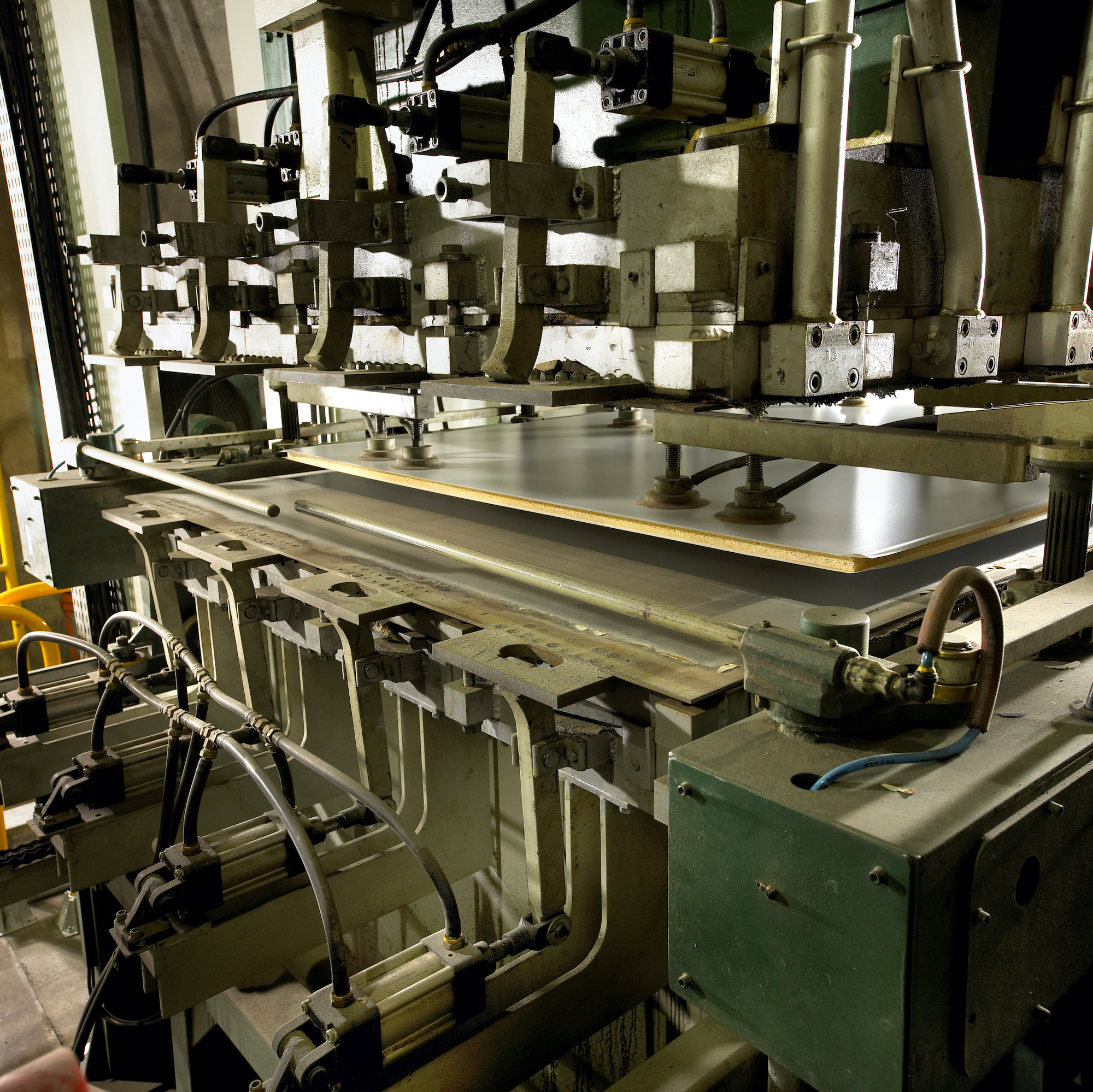 TFL Thermally Fused Laminate Press Machinery at Duramar Warehouse